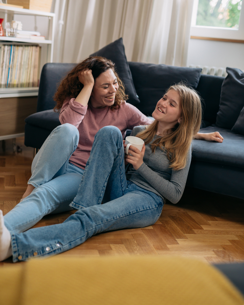 mother and daughter talking after family counselling, in a relaxed setting